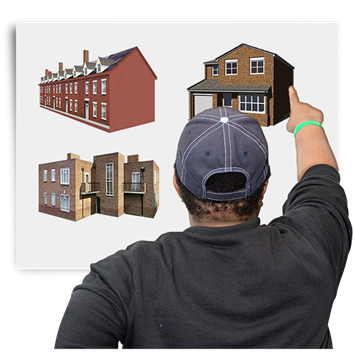 Man pointing at houses