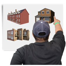 Man pointing at houses